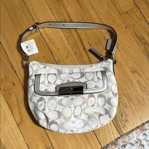 Coach Cream and Silver Wristlet Clutch
